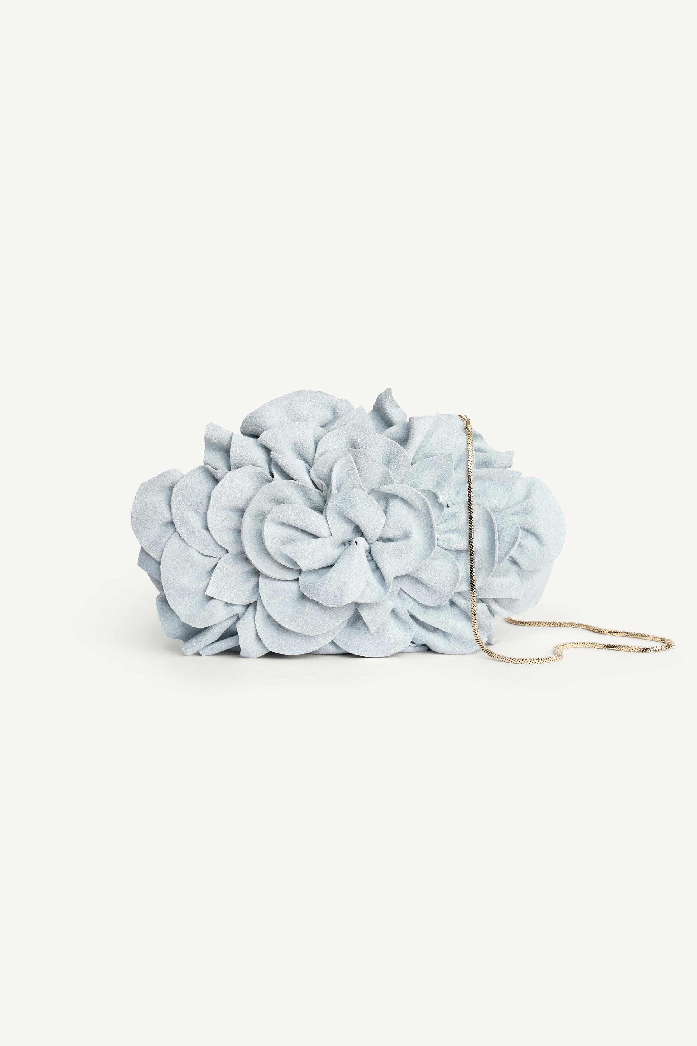 POCHETTE EN CUIR FLEUR ÉDITION LIMITÉE